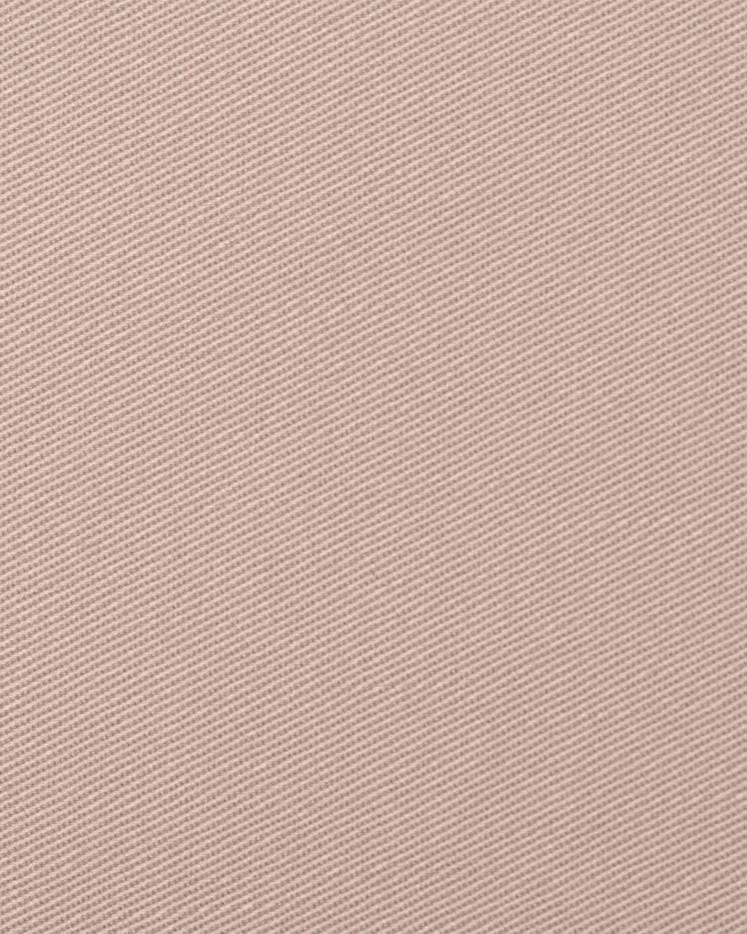 Close up view of custom Genoa Chino pants for men by Luxire in pale pink