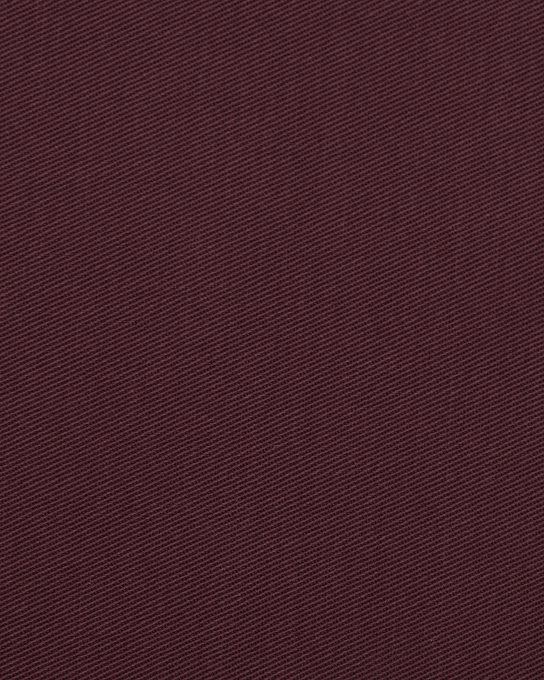 Close up view of custom Genoa Chino pants for men by Luxire in plum