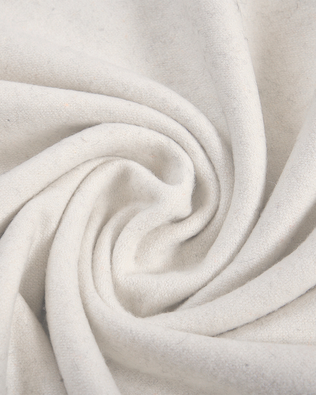 Closeup view of custom wool Chino pants for men by Luxire in cream